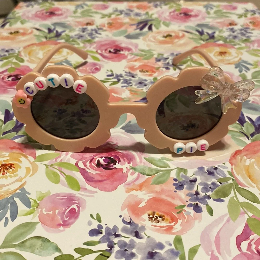 Girls light pink flower shaped cutie pie sunglasses